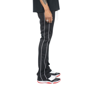 STACKED TRACK PANTS