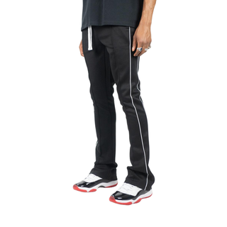 STACKED TRACK PANTS